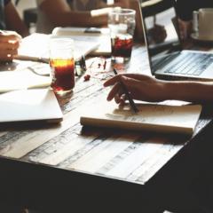 Startup work setting with drinks on a table