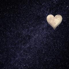 Moon shaped heart in the night sky