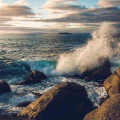 water crashing against rock